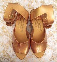 Load image into Gallery viewer, Vivienne Westwood Melissa Rocking Horse Shoes Winged Slave Sandals Gold